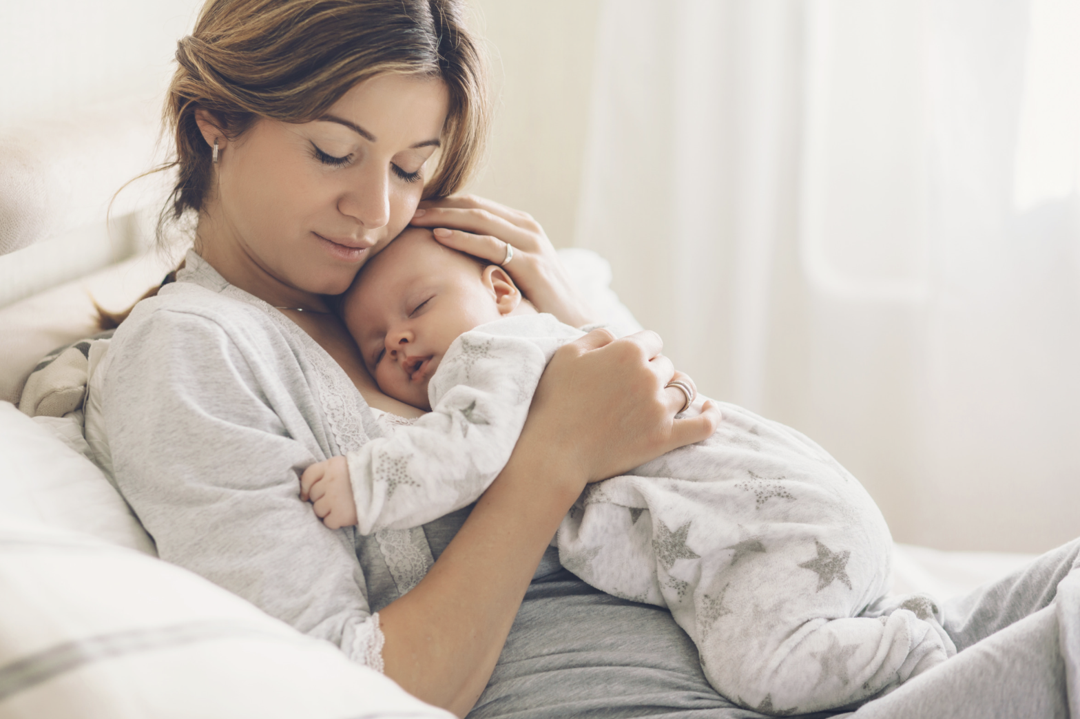 new mother holding her newborn baby