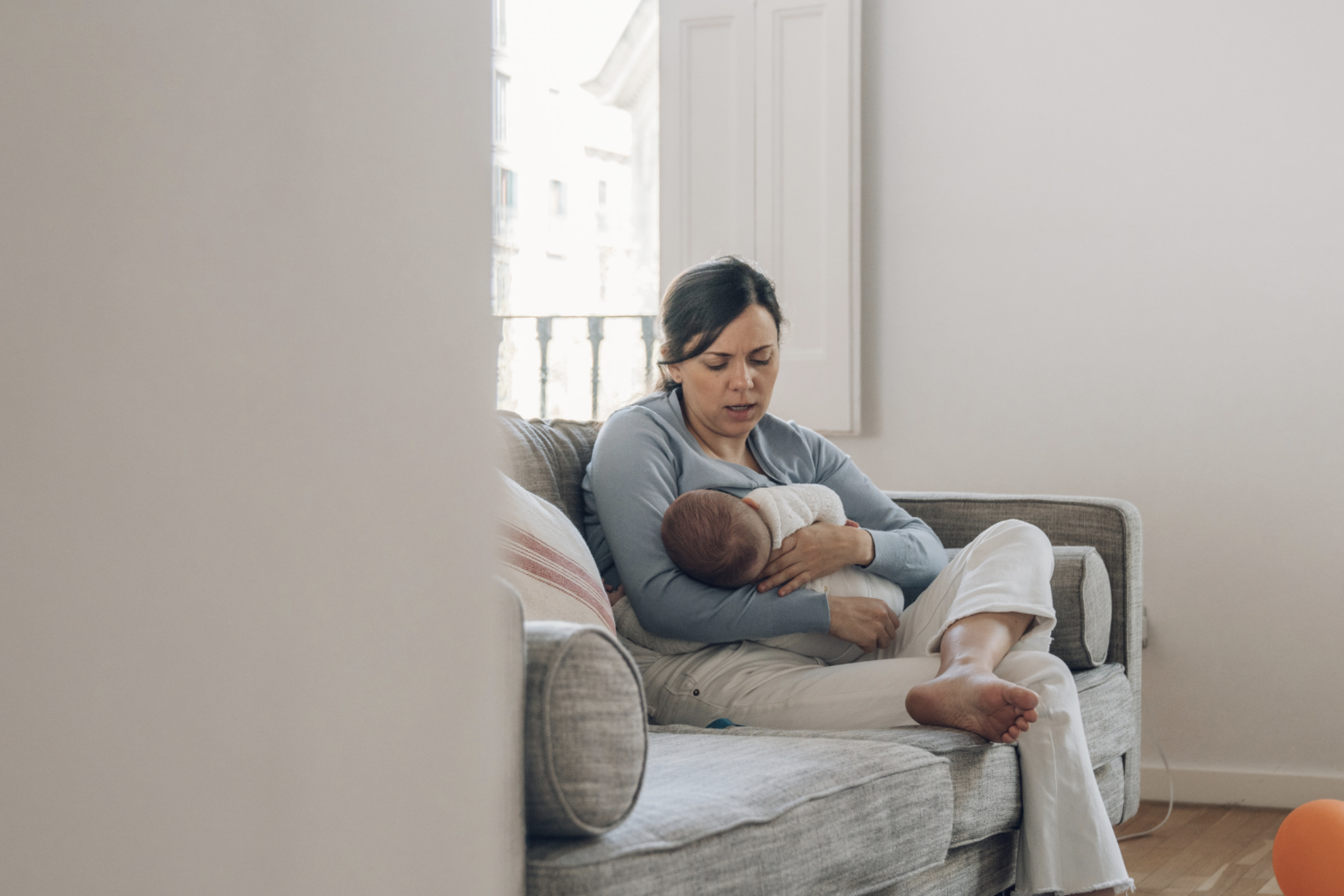 woman breastfeeding baby