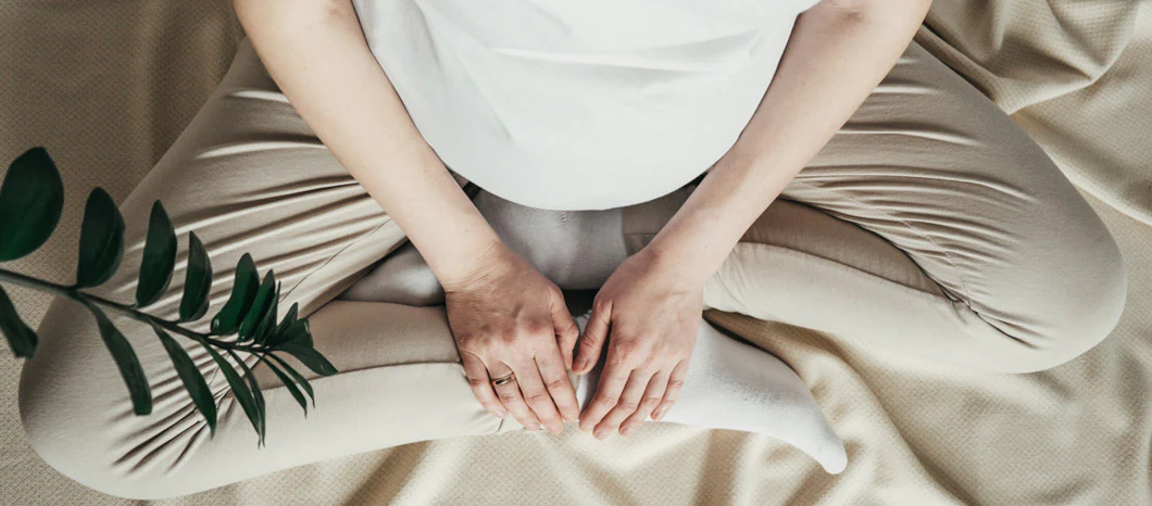 pregnant woman sat cross legged