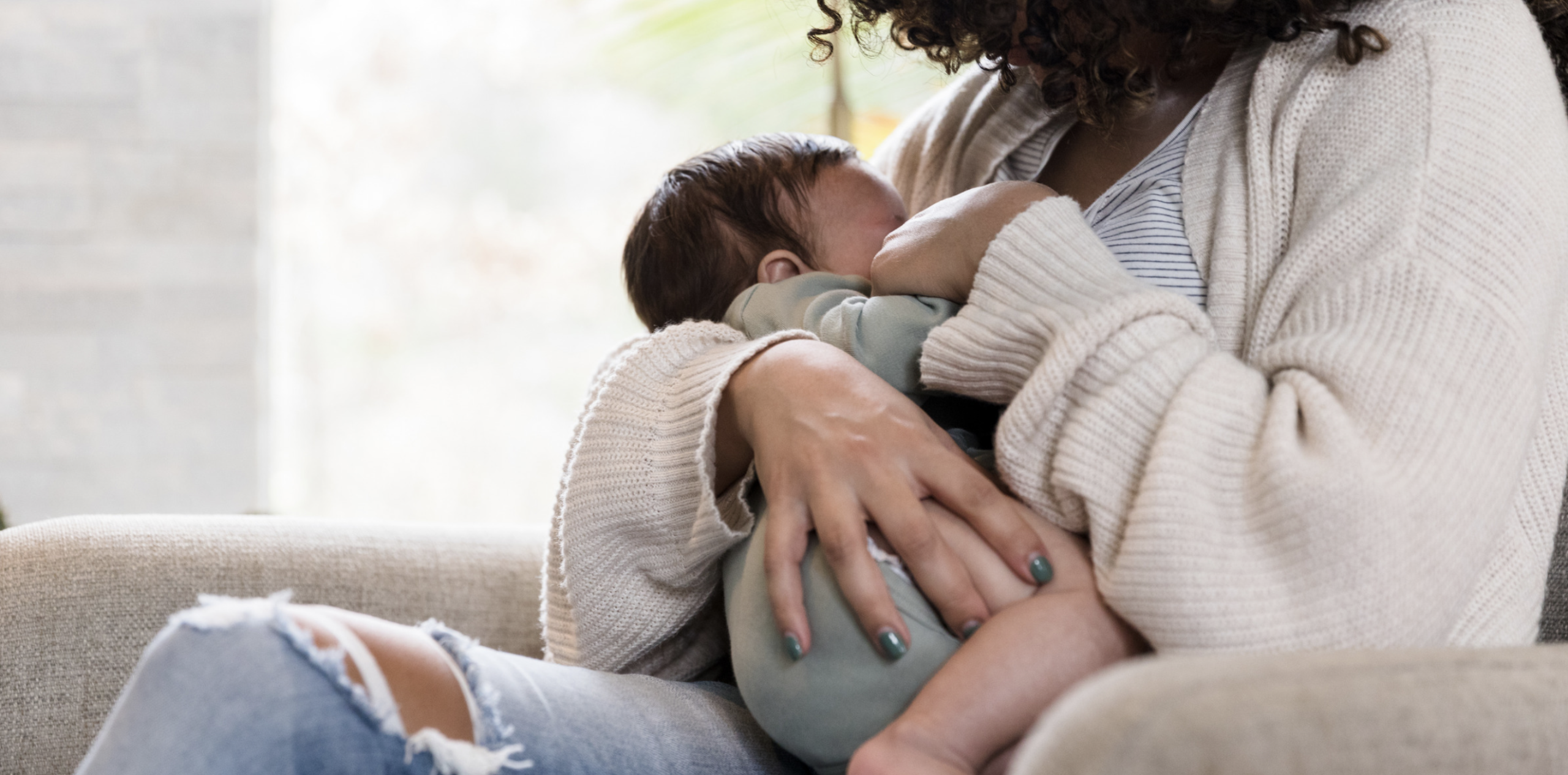 mother breastfeeding baby